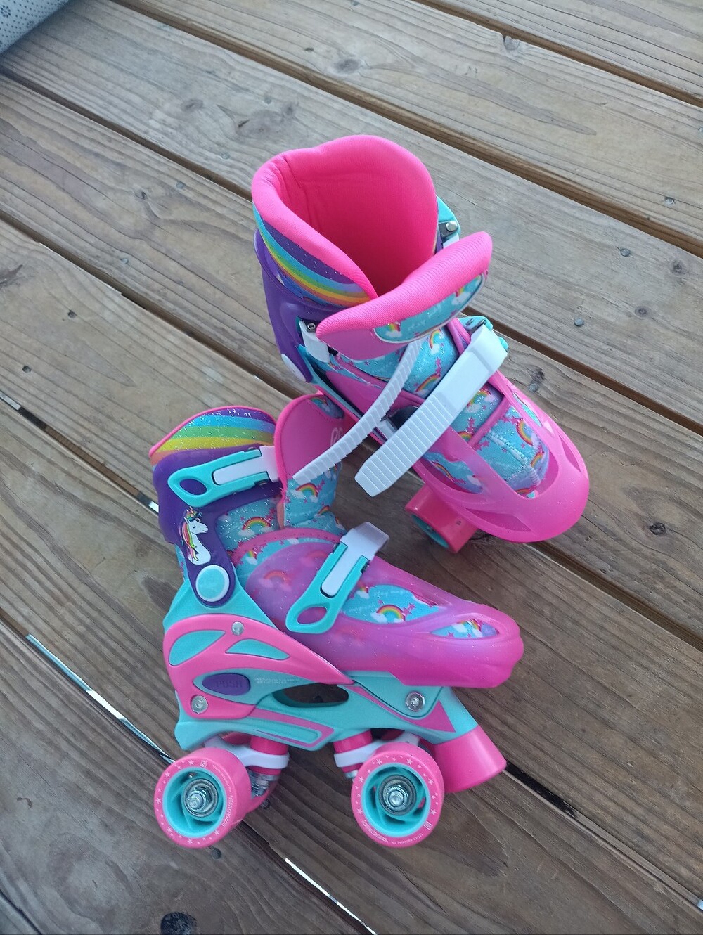 SOLD.  Kids Adjustable Pink & Turquoise Roller Skates with Rainbow Design